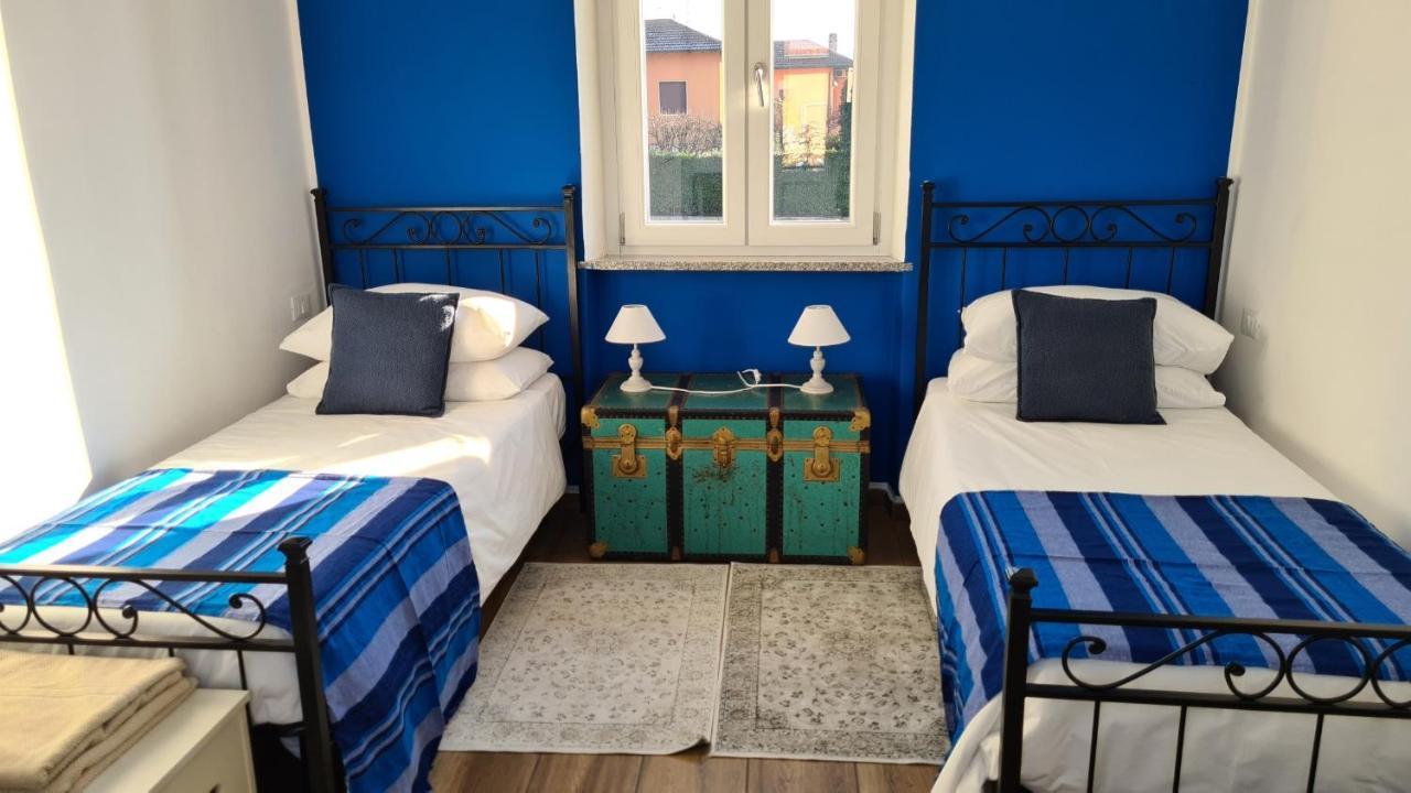 Dragonfly Appartamento Blu Angera Bagian luar foto